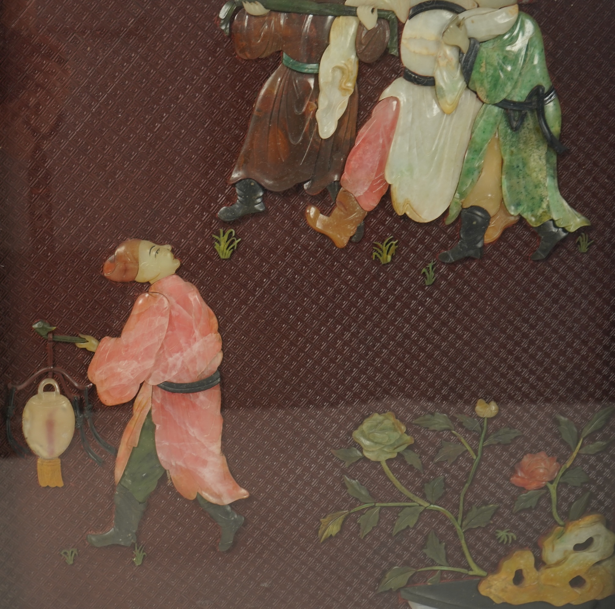 A Chinese carved cinnabar lacquer and hardstone mounted panel, early 20th century